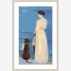 Kvinde med hund p strand